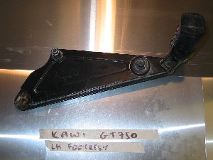 Footrest hanger left used Kawasaki GT750